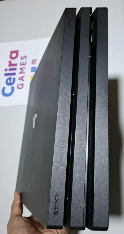 PS4 pro con juegos 2 mandos - miniatura 1
