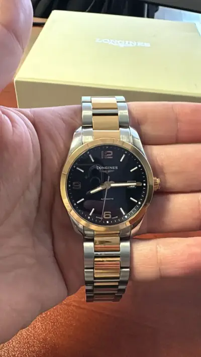 Reloj Longines bicolor automático - miniatura 1