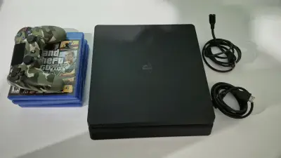 PS4 slim 1TB - miniatura 1