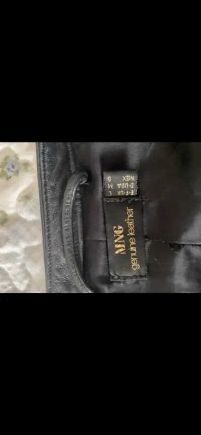 Chaqueta negra de cuero MNG - miniatura 5