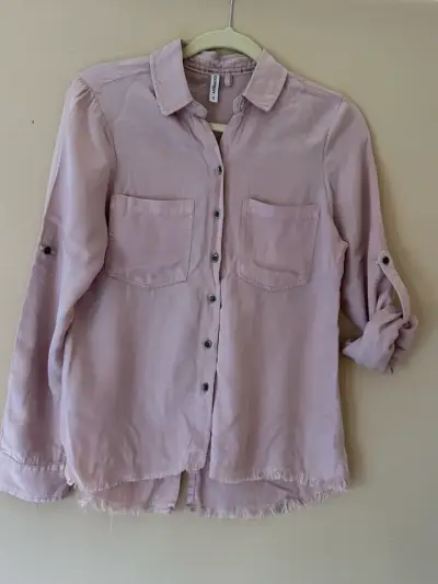 Blusa rosa con bolsillos - miniatura 1