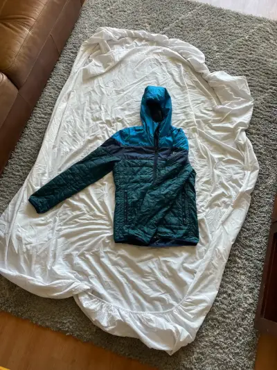 Chaqueta acolchada con capucha azul - miniatura 1