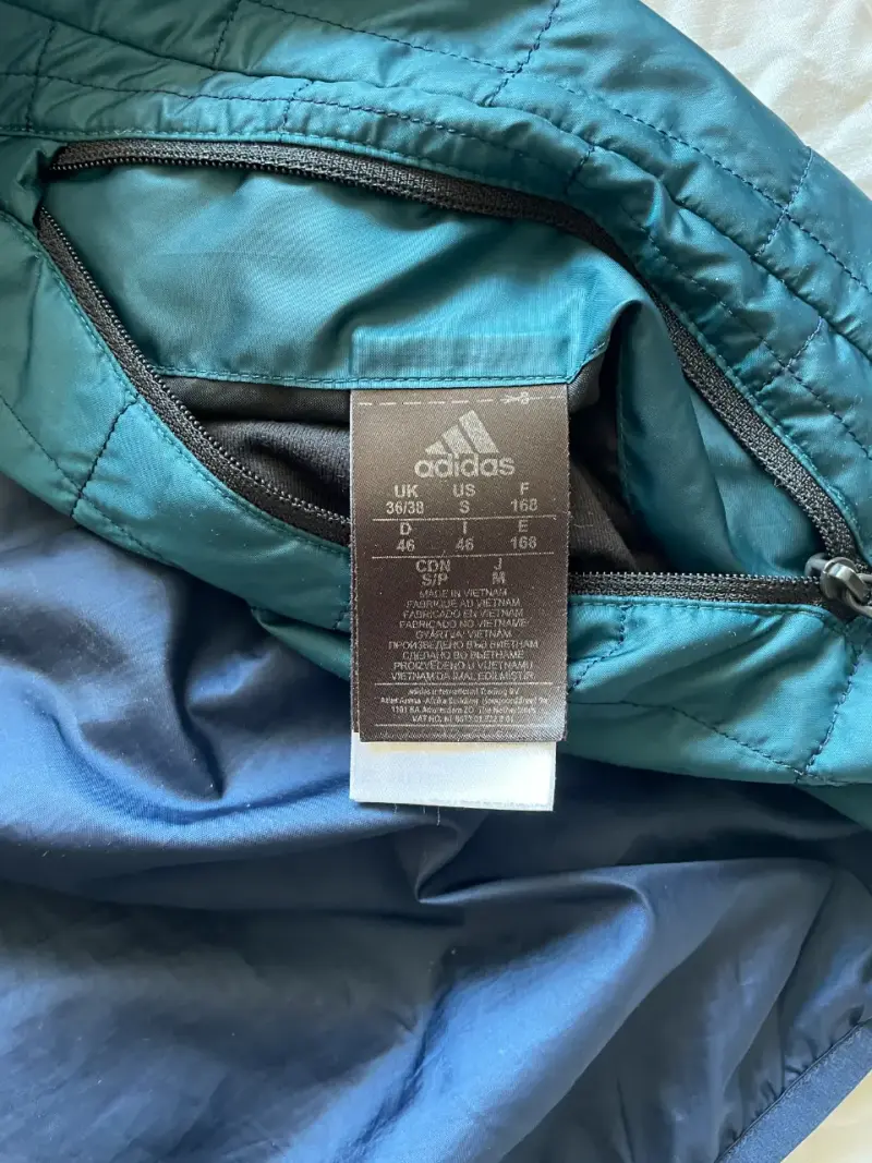 Chaqueta acolchada con capucha azul - 3
