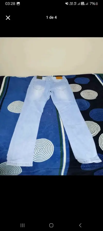 Jeans azul claro de mezclilla - miniatura 1