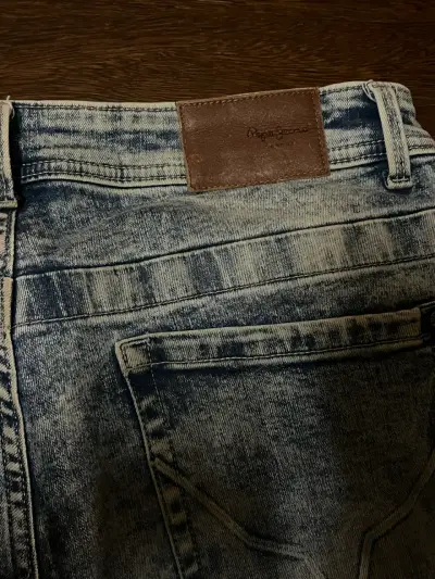 Jeans azul desgastado unisex - miniatura 2