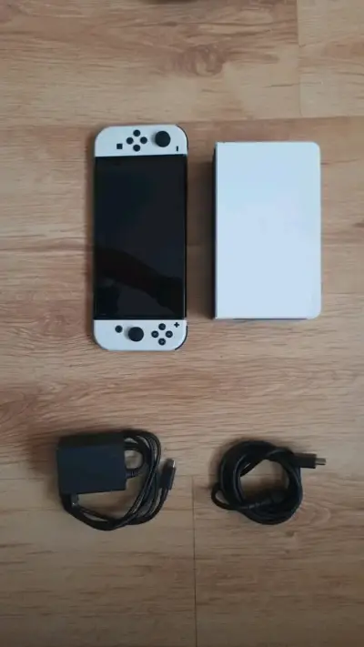Nintendo Switch Oled - miniatura 1