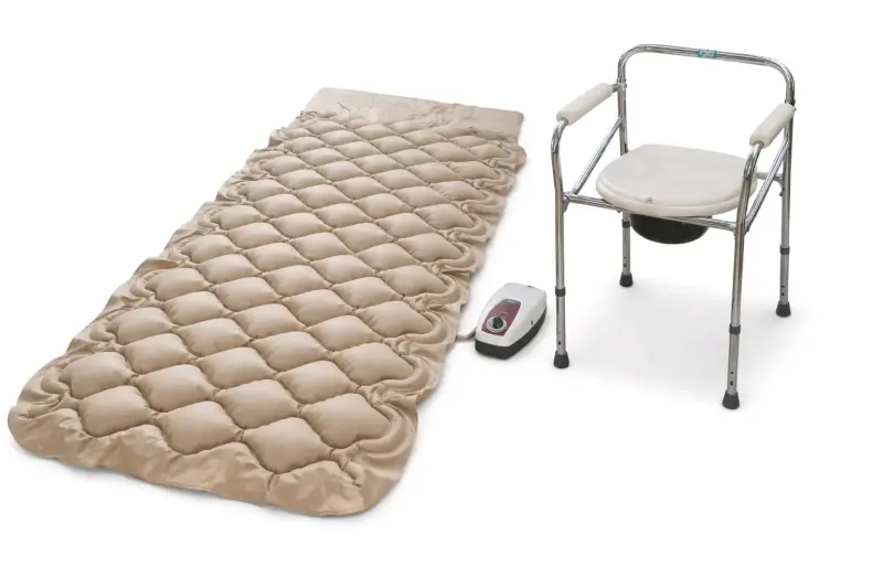 Colchón antiescaras y silla de baño
