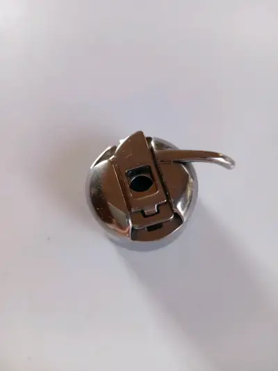 Bobina de maquina de coser - miniatura 1
