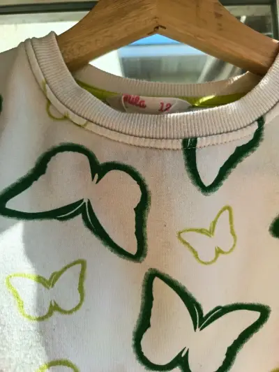 Suéter blanco con mariposas - miniatura 4