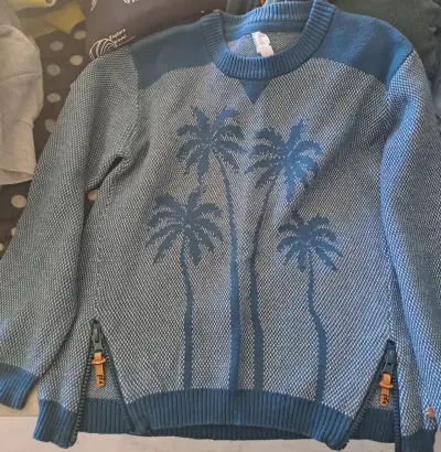 Suéter azul con palmeras - miniatura 1