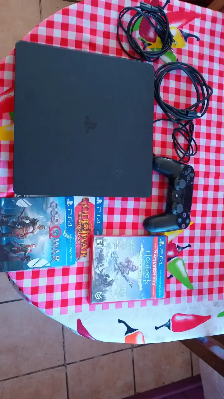 Consola PS4 con juegos y accesorios