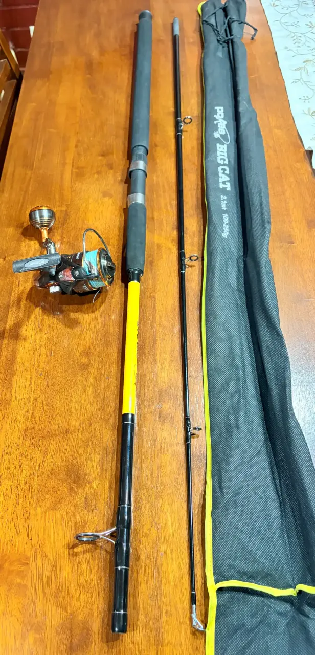 Carrete de pesca y caña botera de spinning - 2
