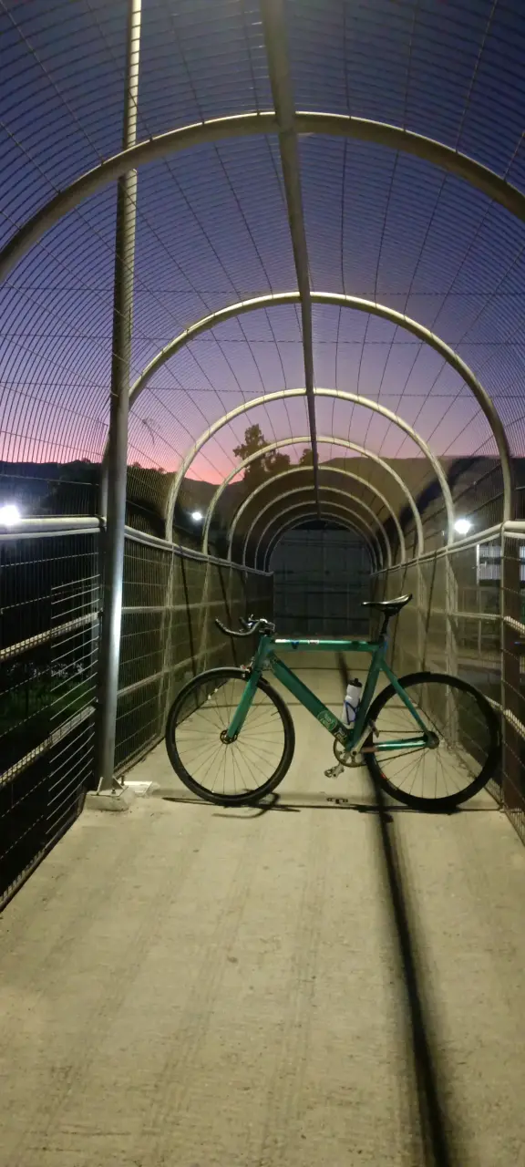 Bicicleta fija verde turquesa