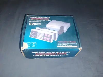 Consola retro 620 juegos integrada - miniatura 1