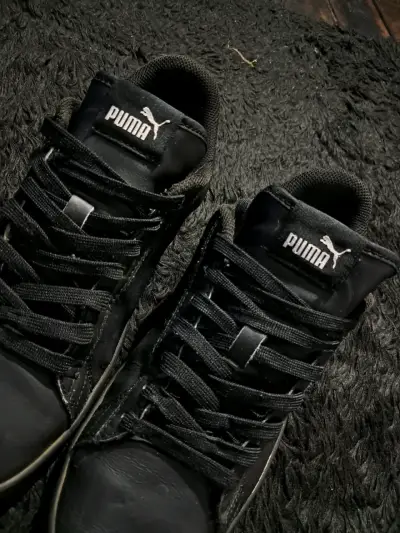 Zapatillas negras Puma - miniatura 1