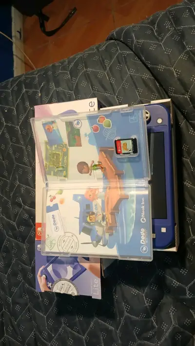 Nintendo Switch Lite Azul con animal crossing - miniatura 3