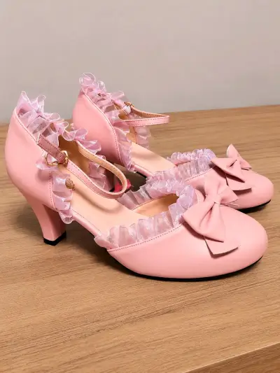 Tacones rosados con volantes - miniatura 1