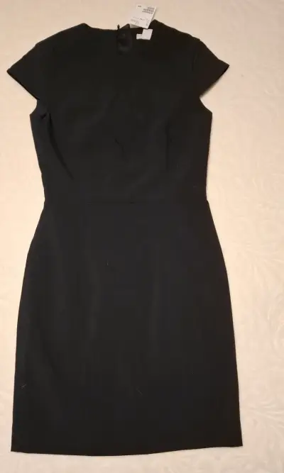 Vestido negro elegante - miniatura 1