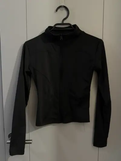 Chaqueta negra con cierre - miniatura 1