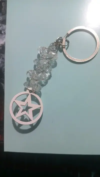 Llavero estrella decorativo - miniatura 1