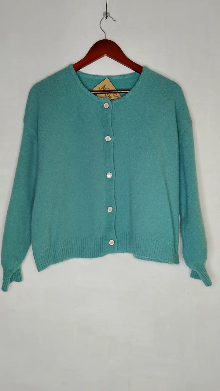 Cardigan turquesa con botones