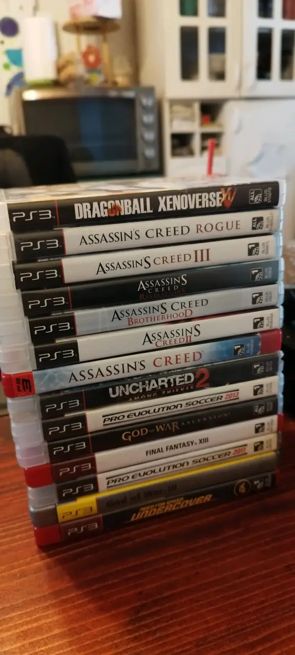 Consola PS3 con control y juegos - 2