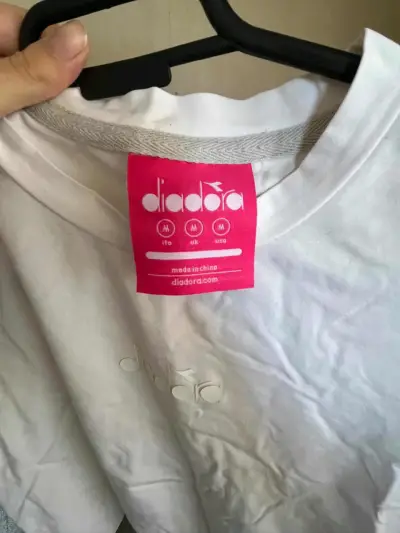 Polera blanca con logo Diadora - miniatura 3