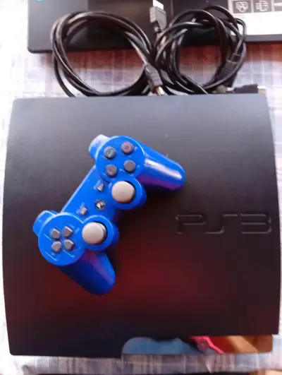 Consola PS3 con control azul - miniatura 1