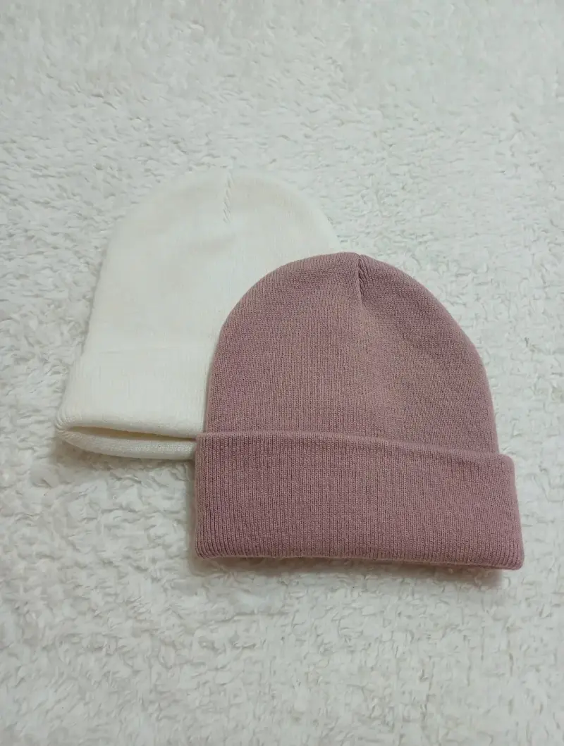 Set de gorros rosado y blanco