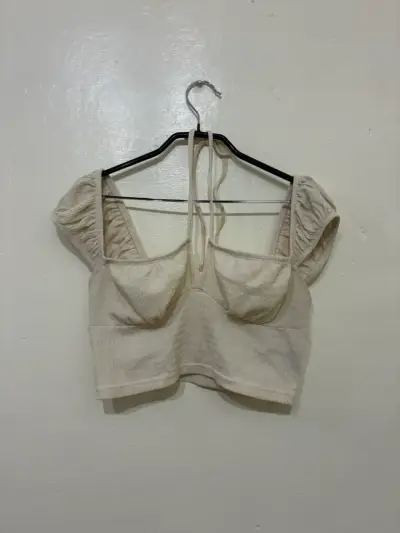 Top beige con mangas abullonadas - miniatura 1