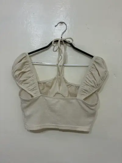 Top beige con mangas abullonadas - miniatura 2