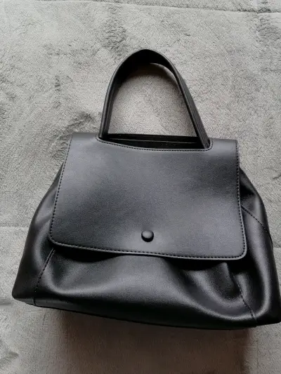Cartera negra elegante - miniatura 1