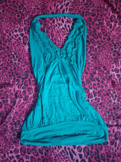 Blusa turquesa sin mangas - miniatura 1