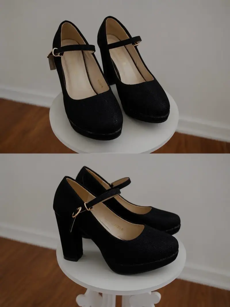 Zapatos de tacón negro con hebilla