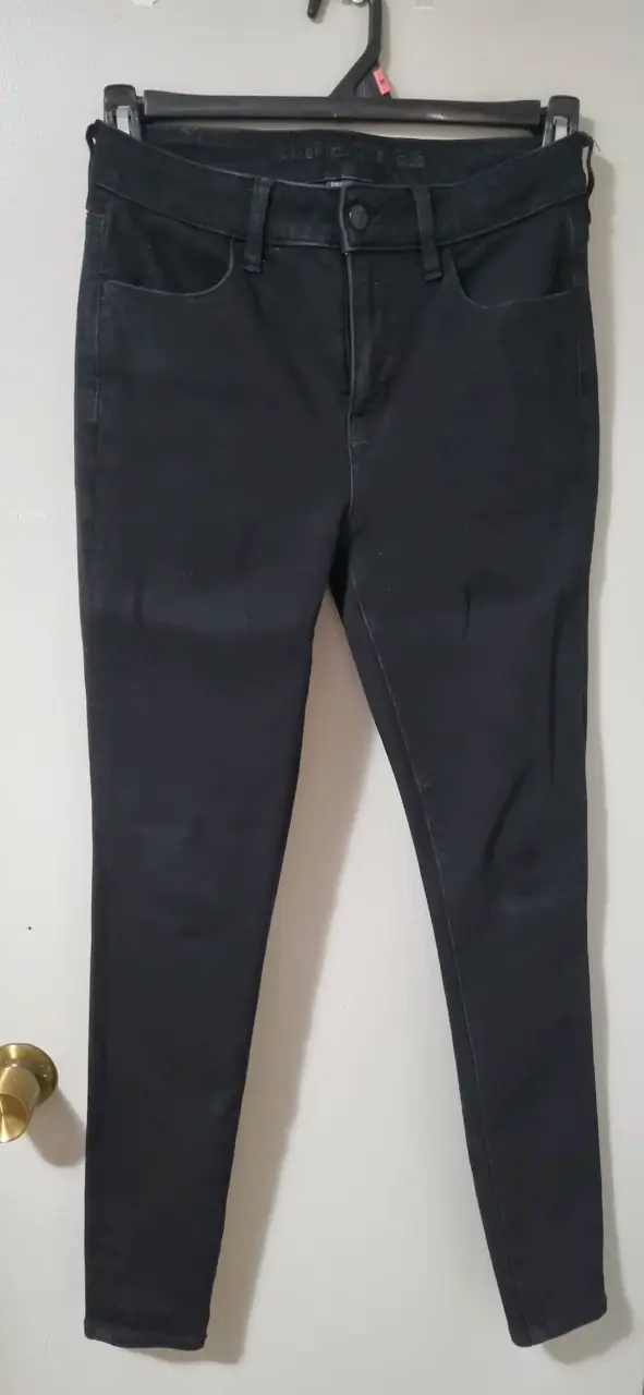 Pantalón negro ajustado - 1
