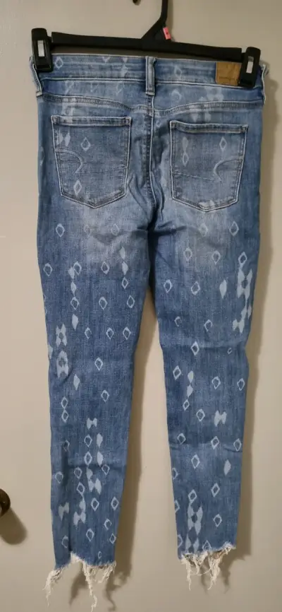 Jeans desgastados azul con patrón - miniatura 2