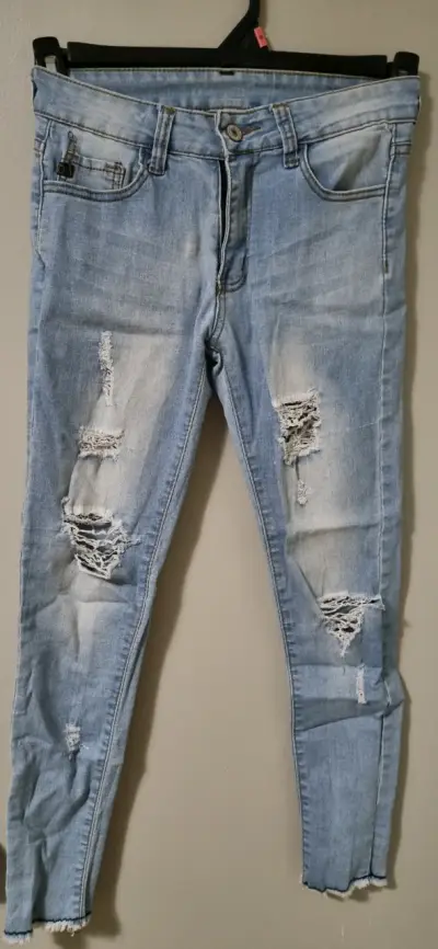 Jeans azul rasgados - miniatura 1