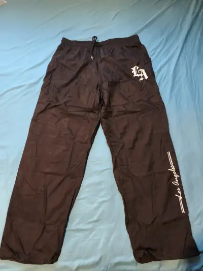 Pantalones deportivos negros - miniatura 1