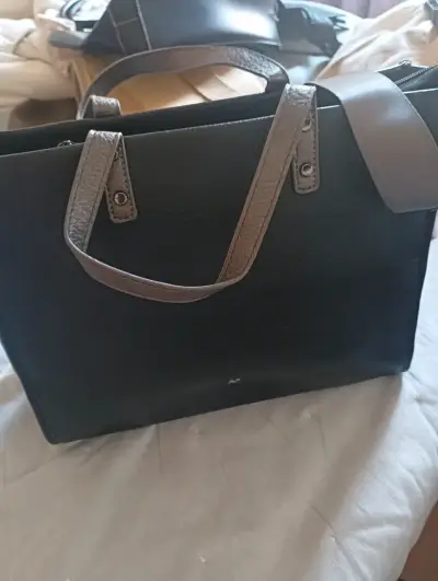 Cartera negra de cuero - miniatura 1