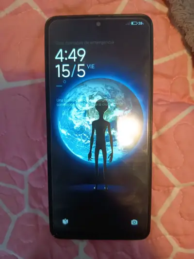 Teléfono inteligente en buen estado - miniatura 1