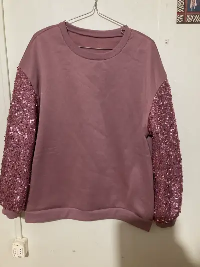 Polerón rosa con mangas de lentejuelas - miniatura 1