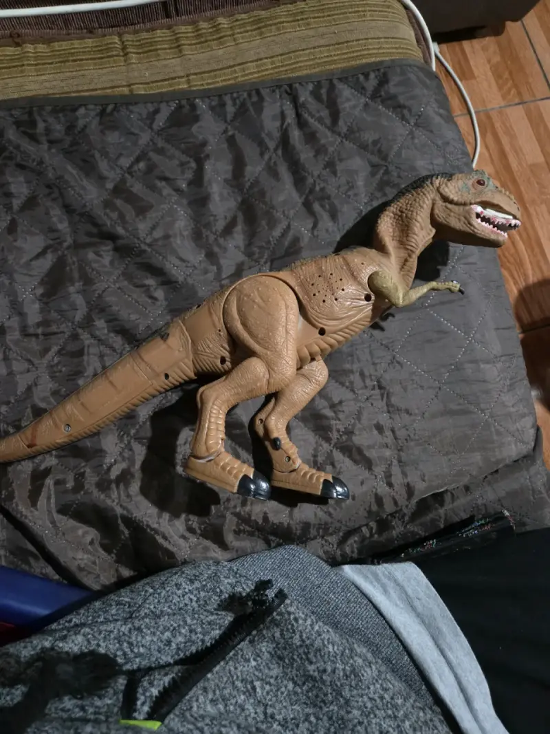 Dinosaurio juguete articulado - 1