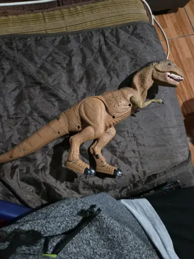 Dinosaurio juguete articulado - miniatura 1