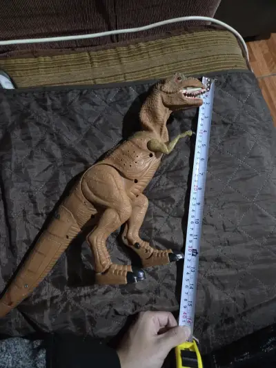 Dinosaurio juguete articulado - miniatura 2