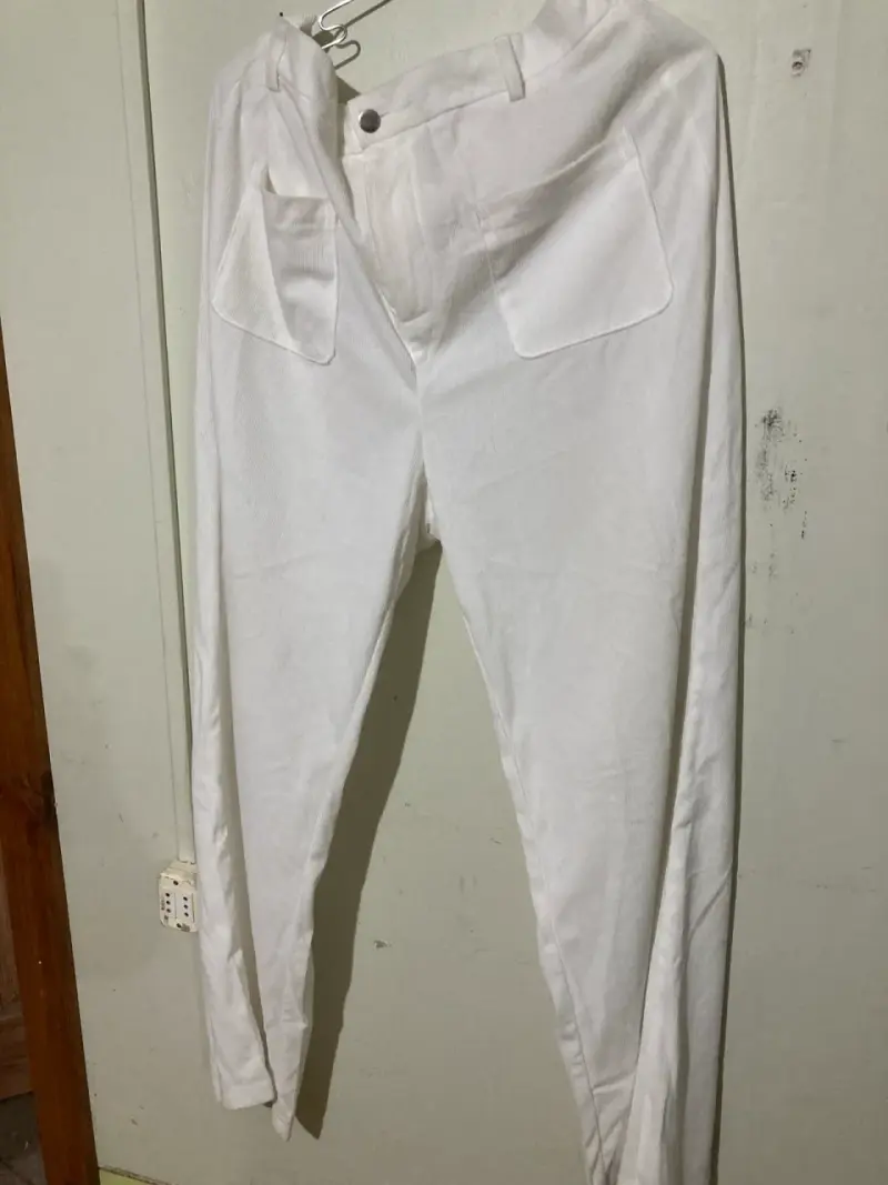 Pantalones blancos de tela cotele fino