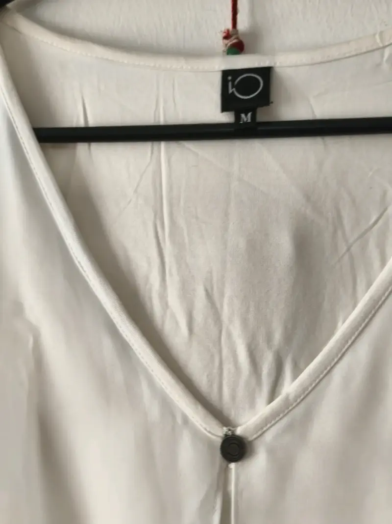 Blusa blanca sin mangas - 3
