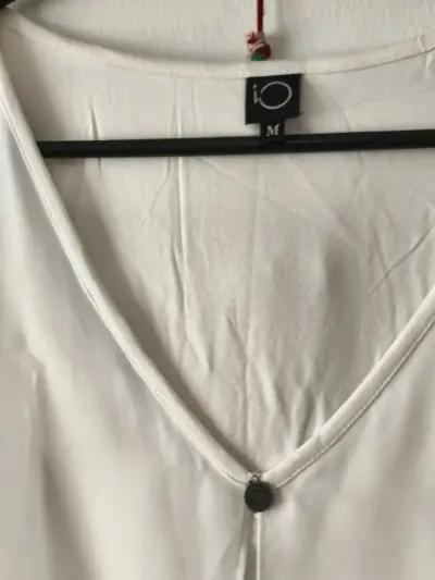 Blusa blanca sin mangas - miniatura 3