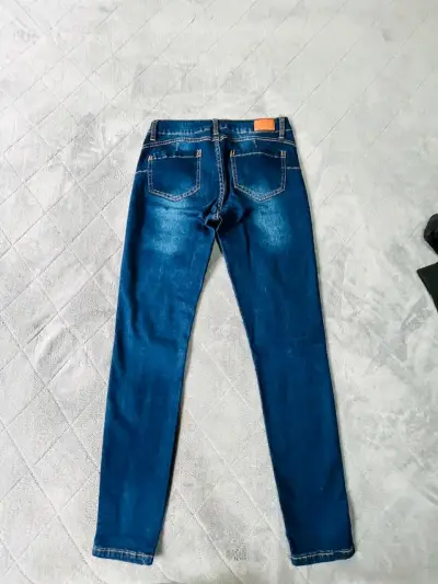 Jeans pitillos con push op - miniatura 3