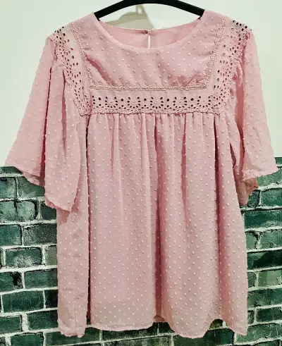 Blusa rosa - miniatura 1
