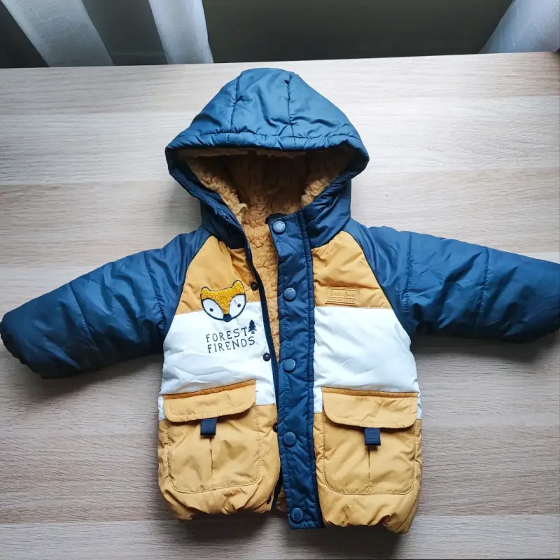 Parka infantil azul y amarilla